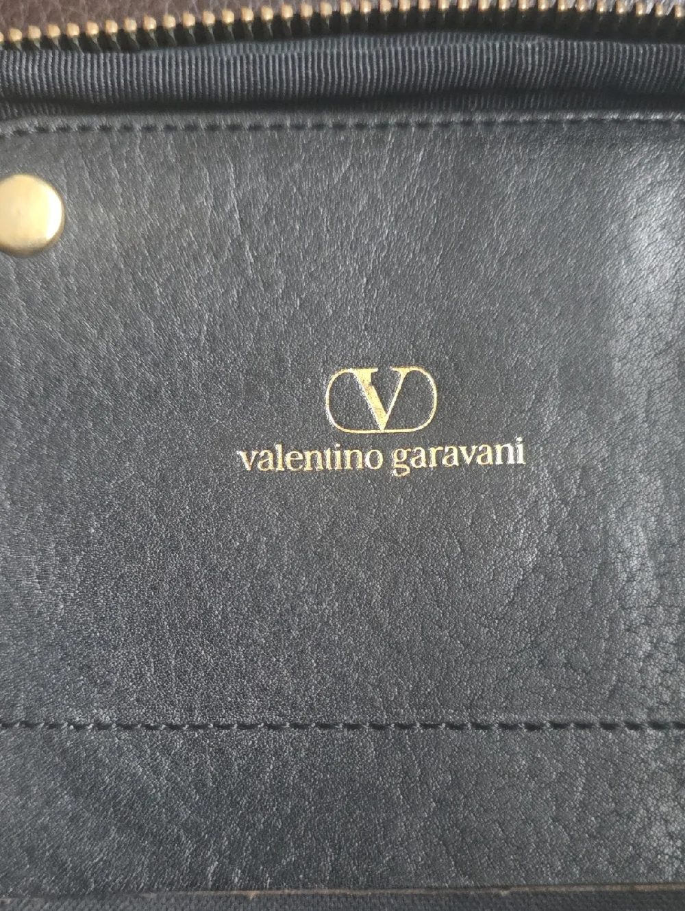 Valentino Garavani Black Leather Bag: Clutch, Dopp, or Organizer